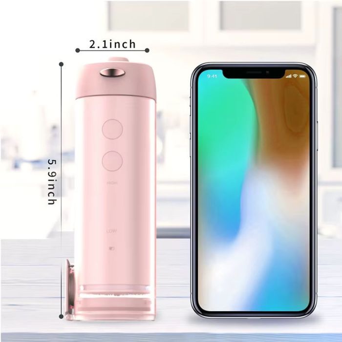 Іригатор h2ofloss hf-10 Mini портативний 5 насадок рожевий